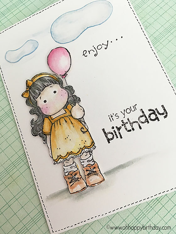 Birthday balloon girl with stamped words 'it's your birthday'  - stamped with black memento ink and coloured in with copic markers.