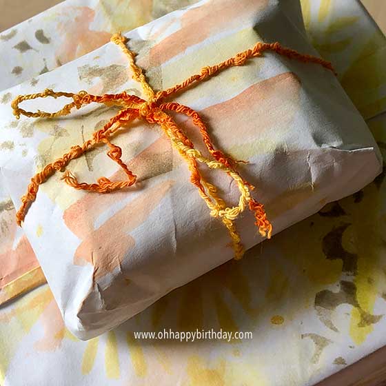 Birthday gifts wrapped in orange and yellow.