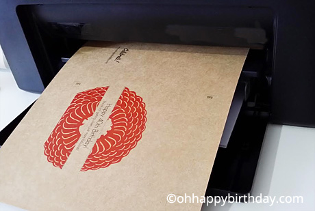 Printing a printable birthday card on kraft card stock with the Fuji Xerox printer.